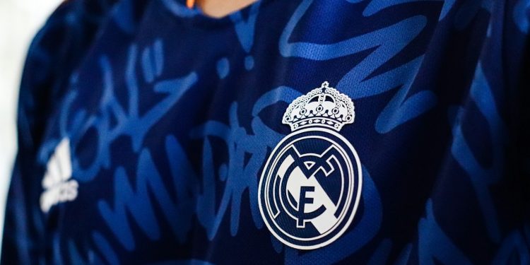 a close up of a soccer jersey with a crown on it
