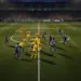 Tactical football match showing defensive block structure and attacking formation with spatial gaps exposed