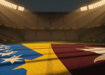 Floodlit World Cup stadium pitch at dusk with blue, yellow, maroon and white colour palette; dramatic shadows and packed stands.