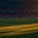 Floodlit World Cup stadium pitch at sunset with Czech and Mexican national colours in atmospheric lighting