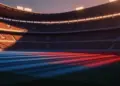 Floodlit stadium at golden hour with dramatic shadows, packed stands, and national colours in atmospheric lighting.