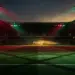Floodlit stadium pitch in red and green lighting with geometric shadows and billowing goal net.