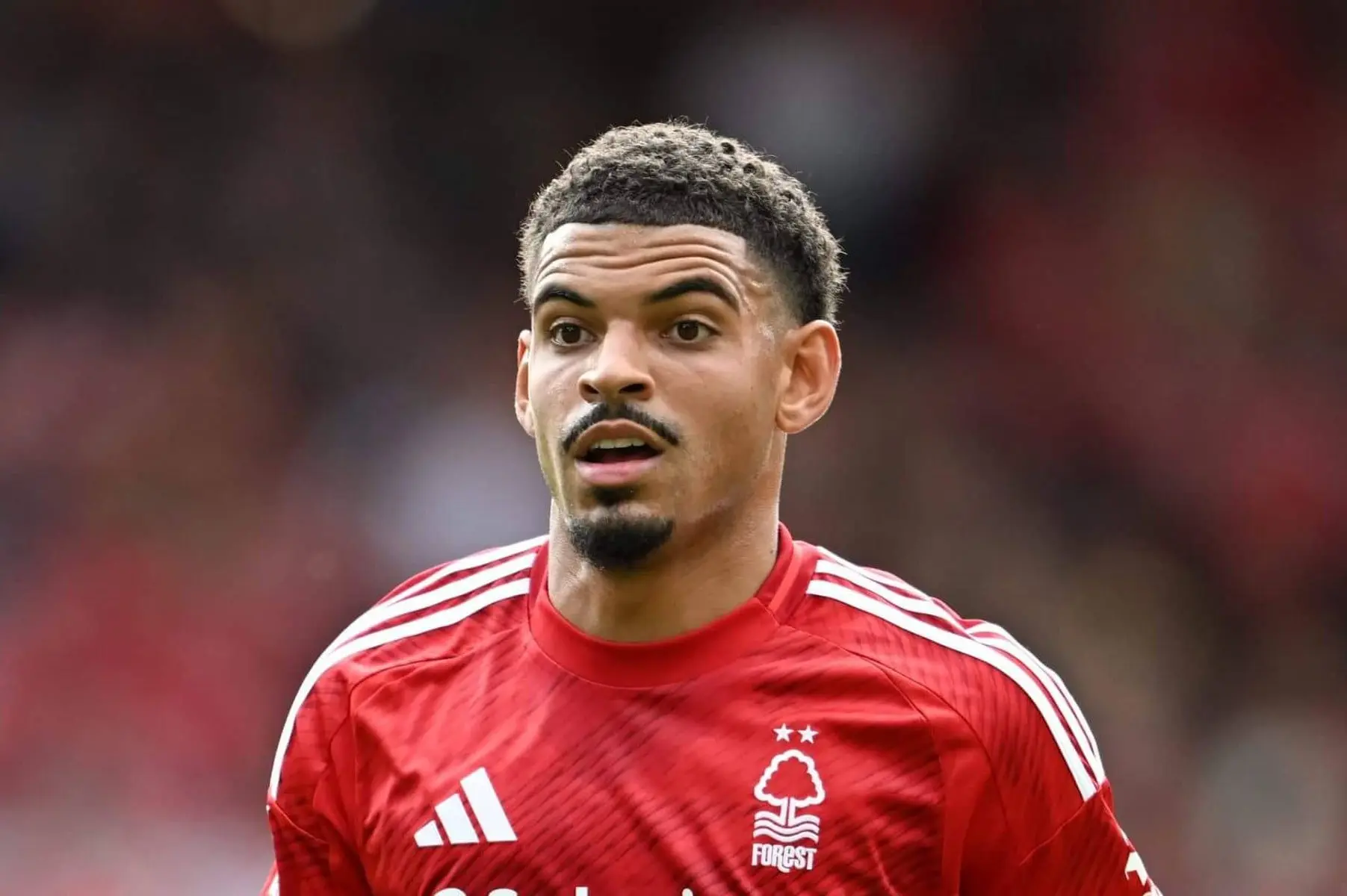 Morgan Gibbs-White wearing a red Nottingham Forest home kit